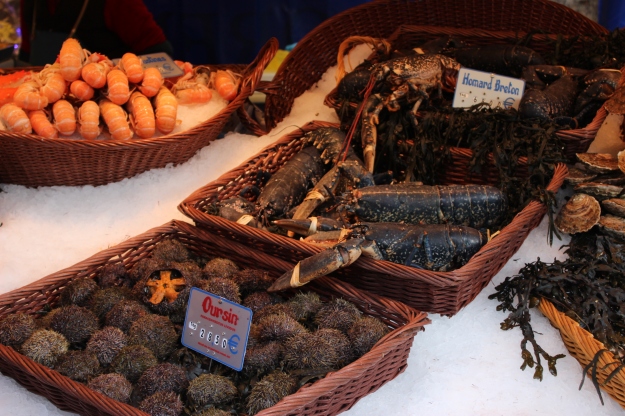 Blue Breton lobster and sea urchin